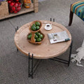 Table basse ronde en sapin et fer forgé style rustique